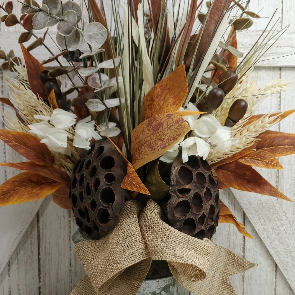 Metal Milk Can with Floral Arrangement Burlap Bow Cattails Dried Lotus